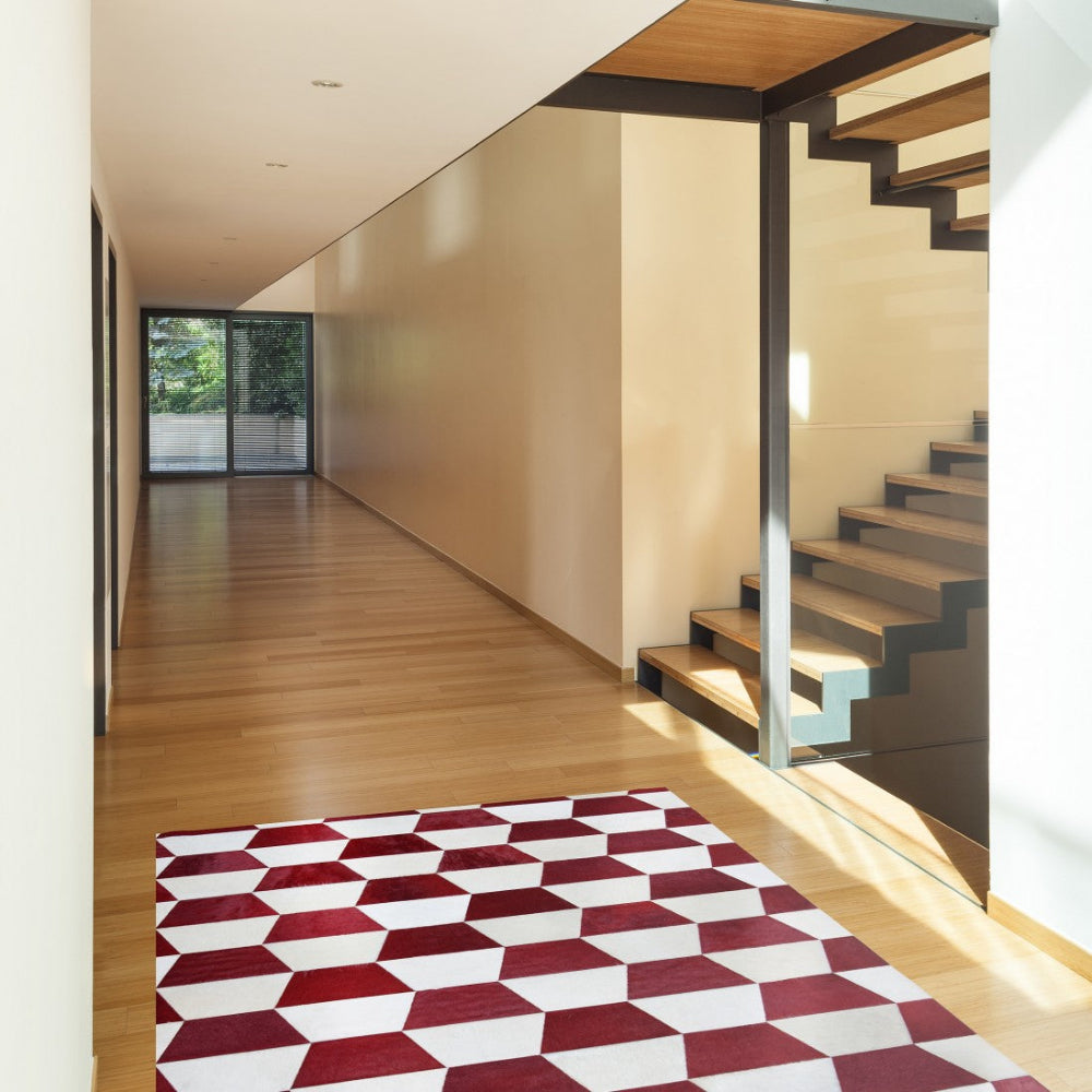 Alfombra de diseño en piel Merengue Rojo en un recibidor