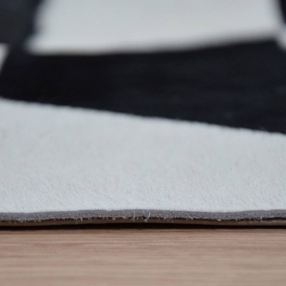 detalle de Alfombra de diseño en piel Merengue Negro