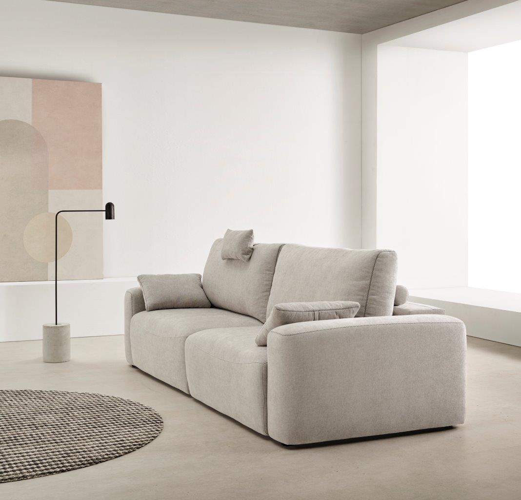 Sofá de diseño modelo CLOUD con dos asientos extraíbles a suelo motorizados.