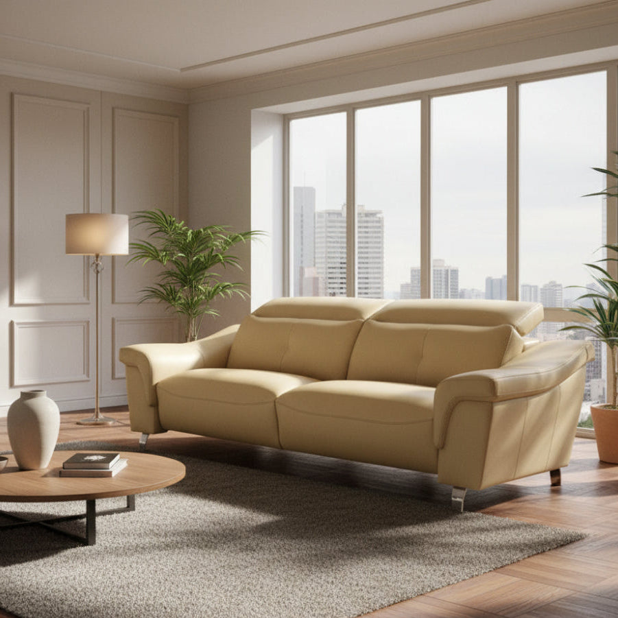 sofa de piel pata alta cabezal abatible pata cromo