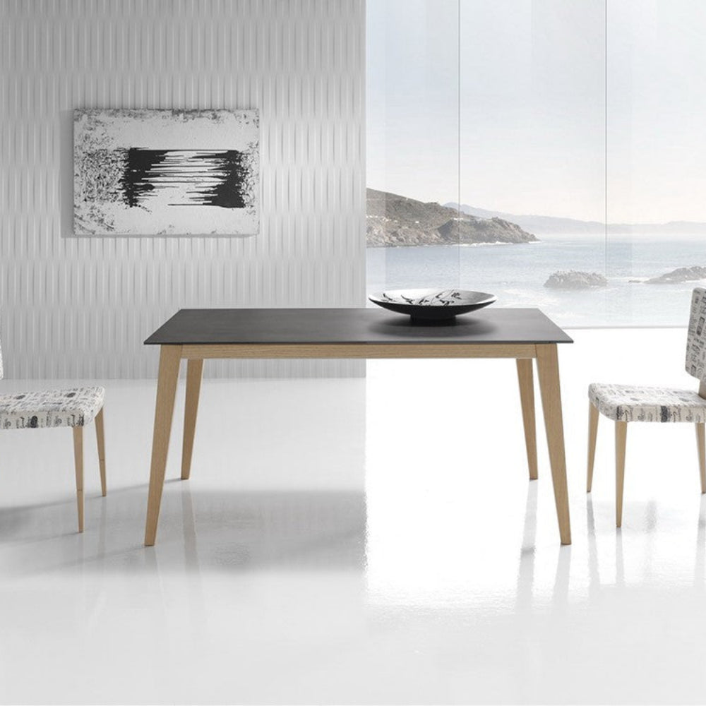 Mesa comedor de diseño extensible modelo IN-NRDC tapa porcelánico