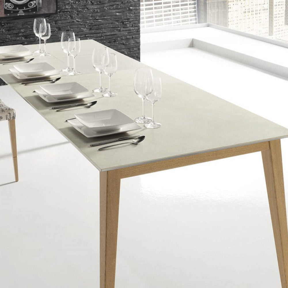 Mesa comedor de diseño extensible modelo IN-NRDC tapa porcelánico