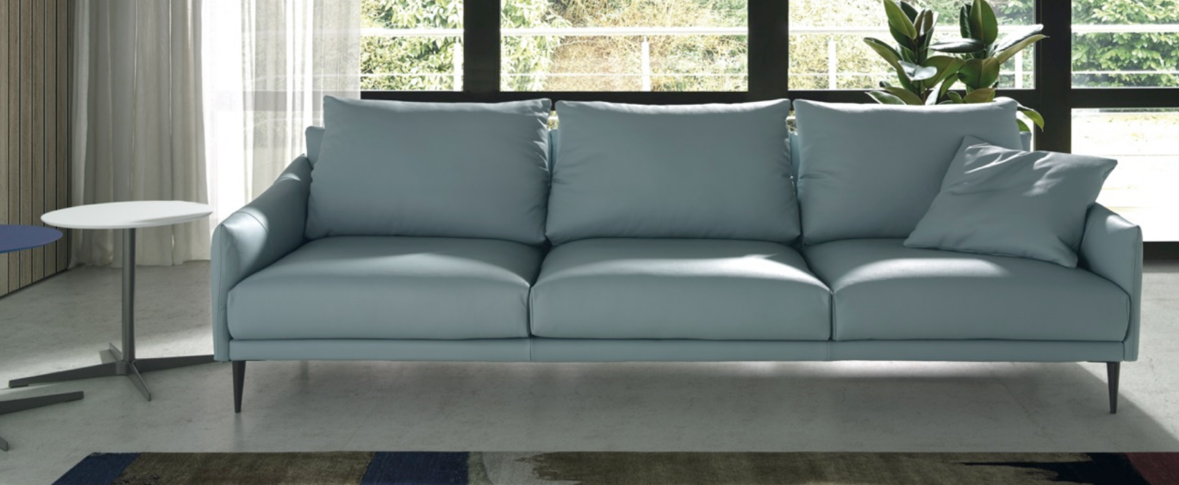 Sofá de diseño totalmente desenfundable y fondo reducido modelo MOMA en piel