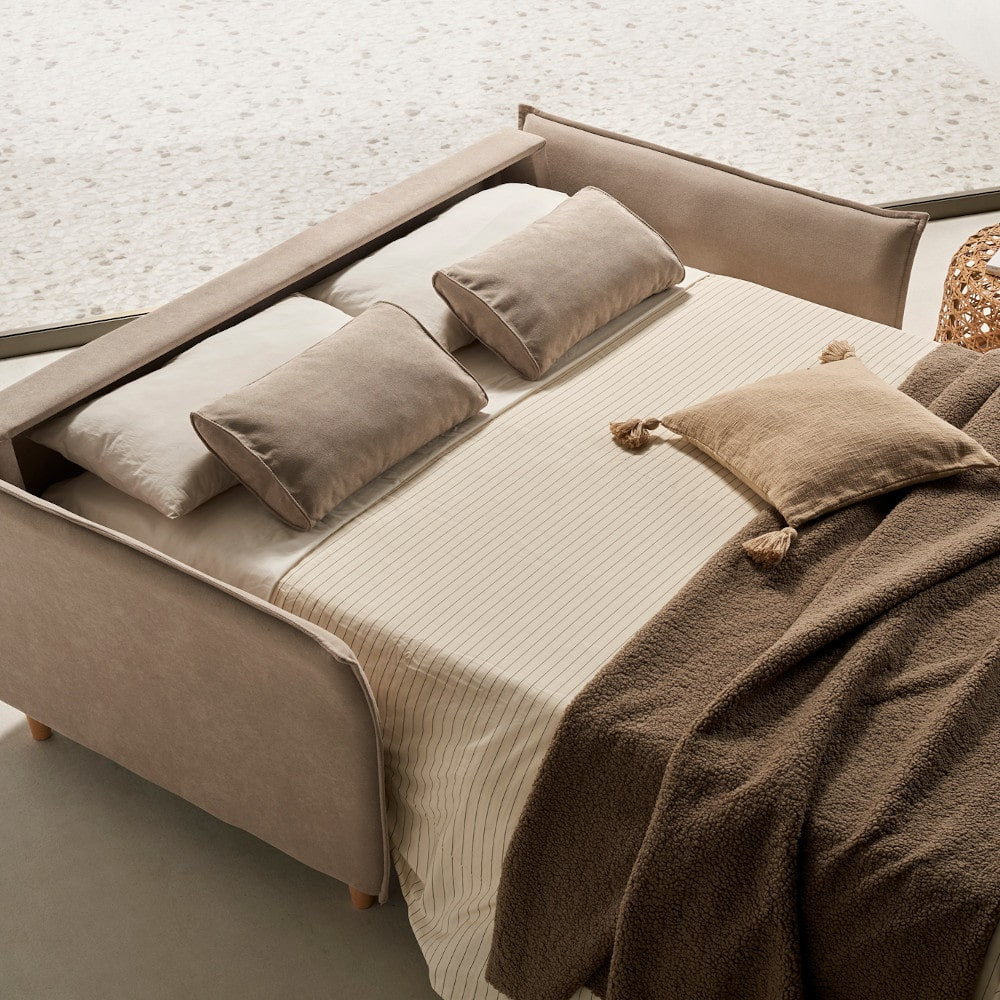 sofa cama modelo gaviota abierto en un ambiente relajado disponible en sidivani