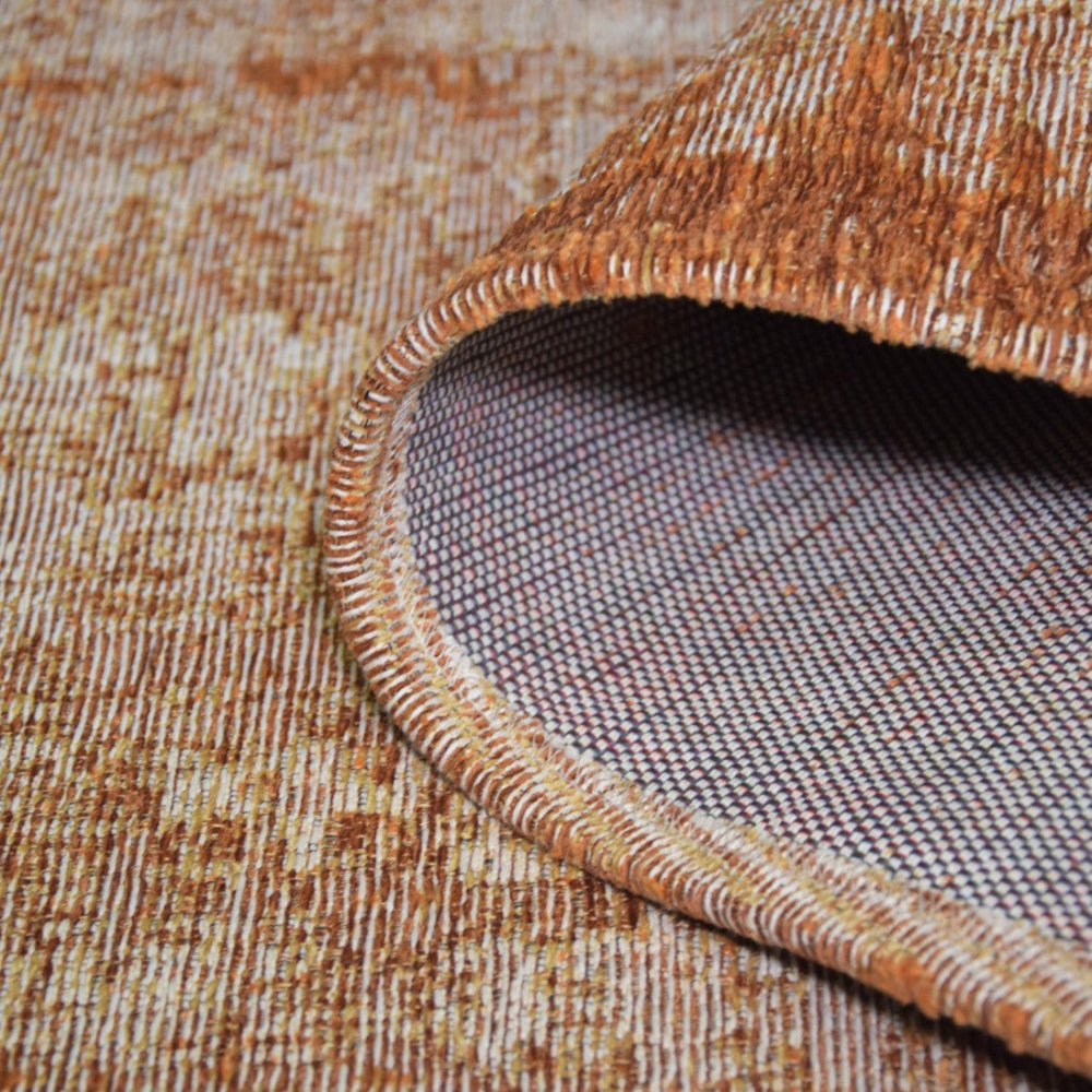 detalle de la alfombra antik chenille orange