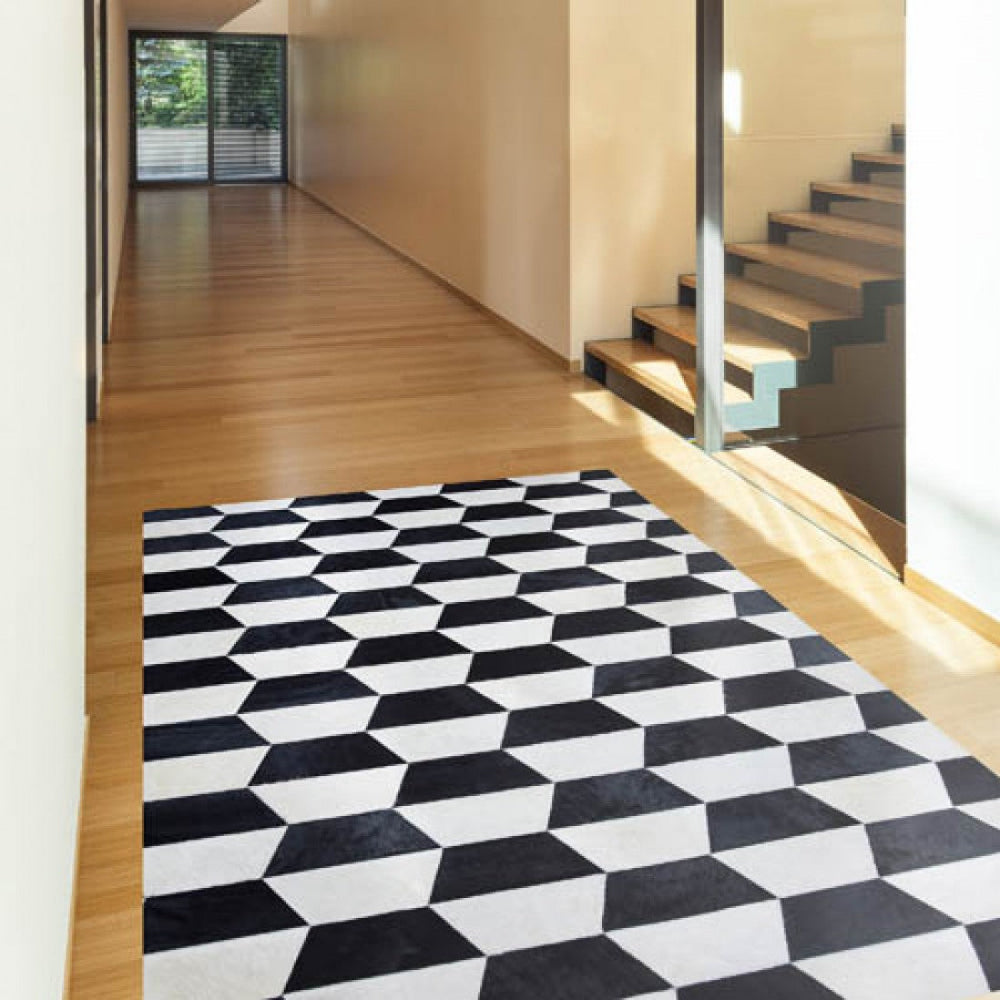 Alfombra de diseño en piel Merengue Negro en un recibidor