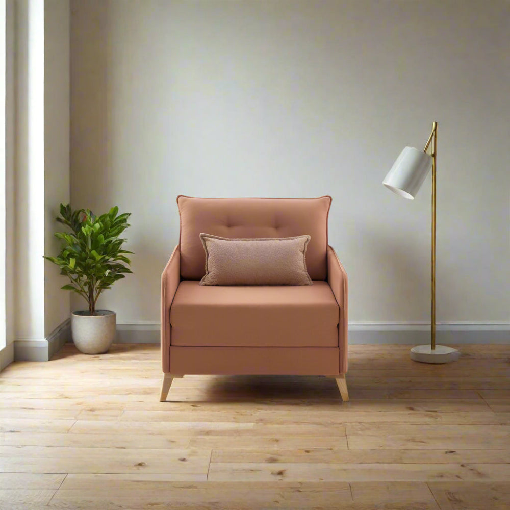 sillon cama modelo comporta en el salon con lampara decortaiva y planta