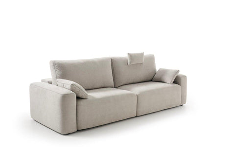 Sofá de diseño modelo CLOUD con dos asientos extraíbles a suelo motorizados.