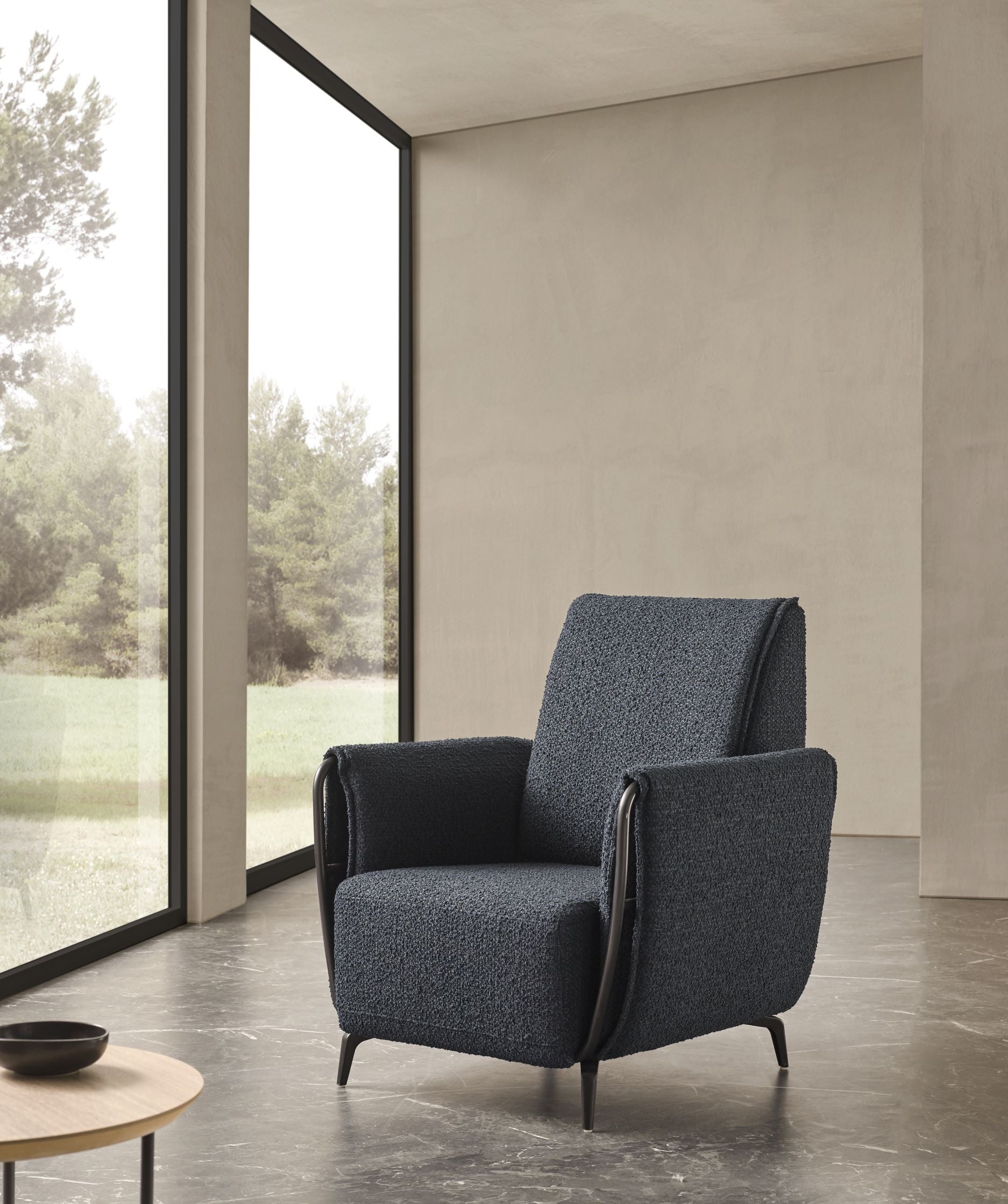 Butaca de diseño italiano modelo BUCLE