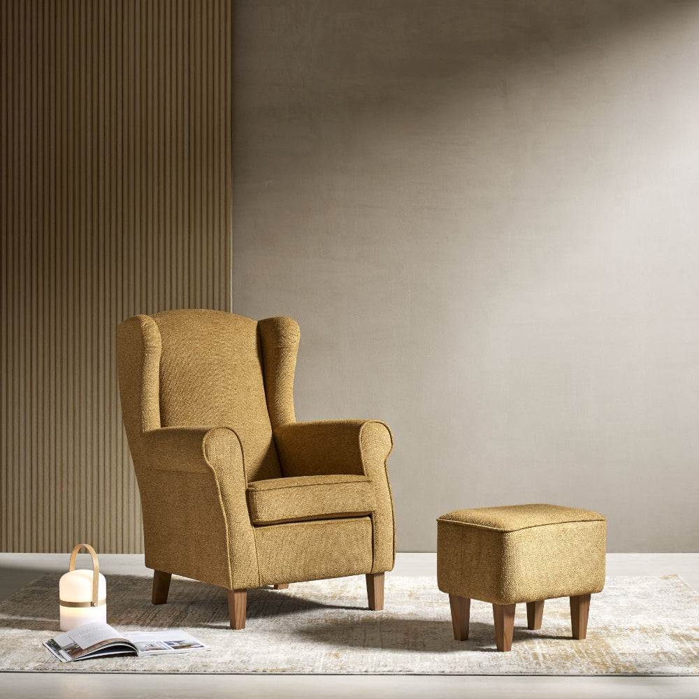 Sillón orejero modelo ORBE con pouf